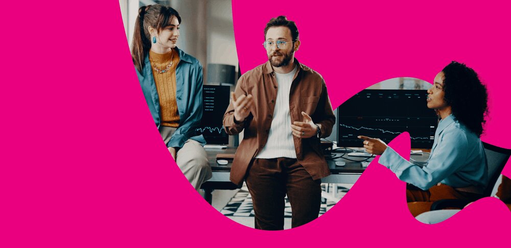 Three people discussing ERP advisory services in an office.