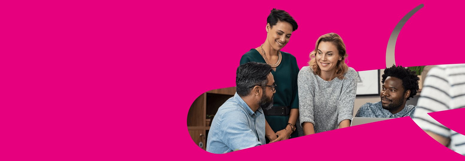 Happy team members collaborating in a at work, focusing on digital transformation and ERP implementations.