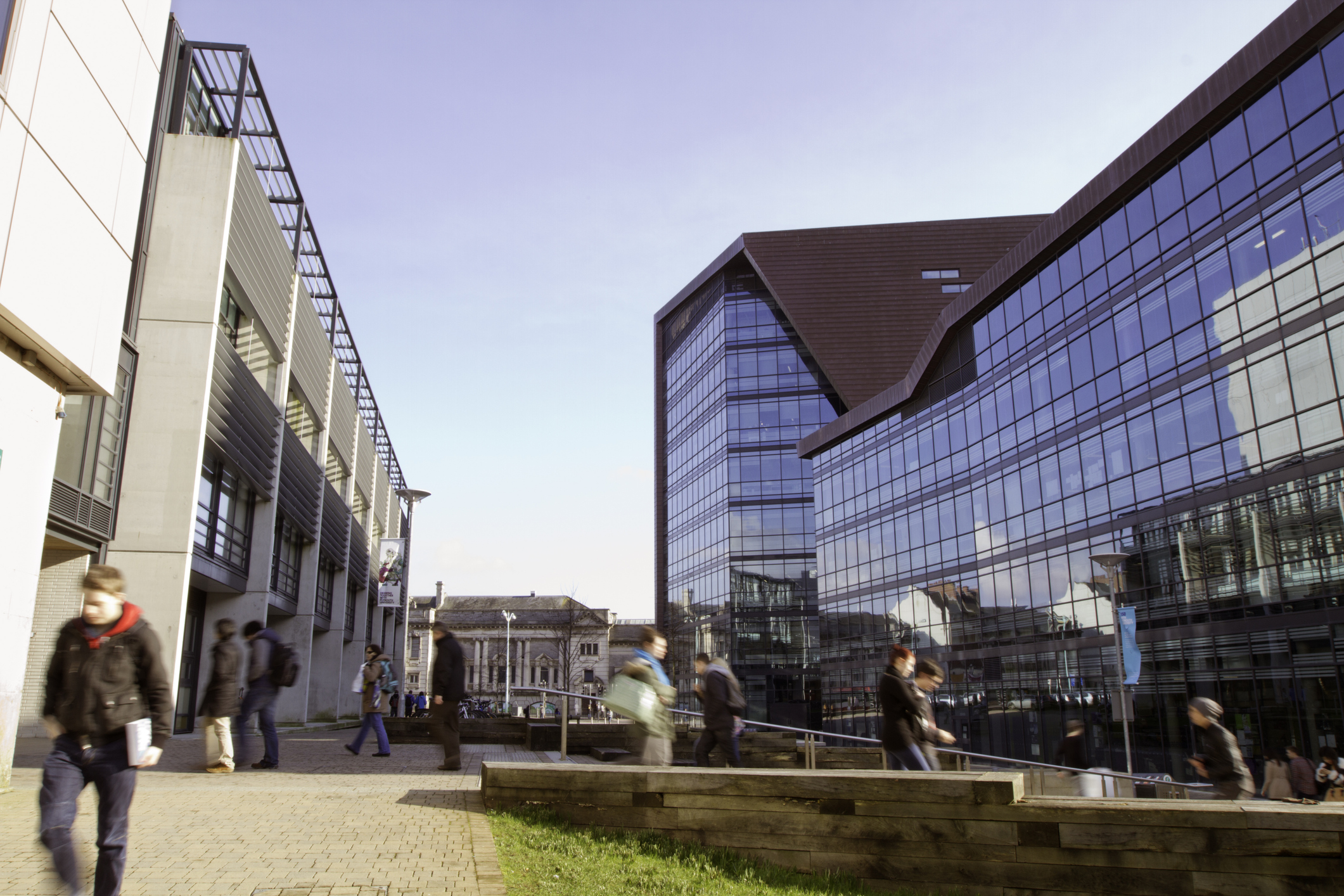 Students can be seen walking to and from the Roland Levinsky building at the University Of Plymouth in the city centre of Plymouth. A popular and busy part of the city.